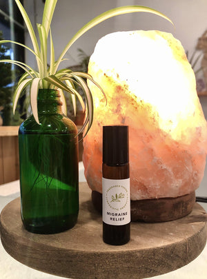 Migraine relief essential oil blend. Created with wintergreen, bergamot, lavender, sandalwood, peppermint, clary sage, chamomile, and rose geranium essential oils.
